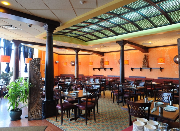 View of the restaurant dining room showing the traditional bamboo lattice ceiling design at Karaikudi Chettinad Scarborough