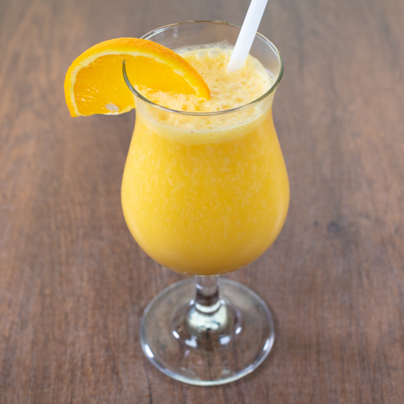 Creamy fresh Mango Milkshake sweet drink prepared with real mango pulp at Karaikudi Chettinad Restaurant